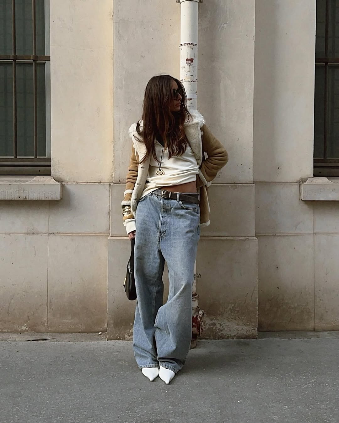 Chic baggy pants ensemble with layered outerwear