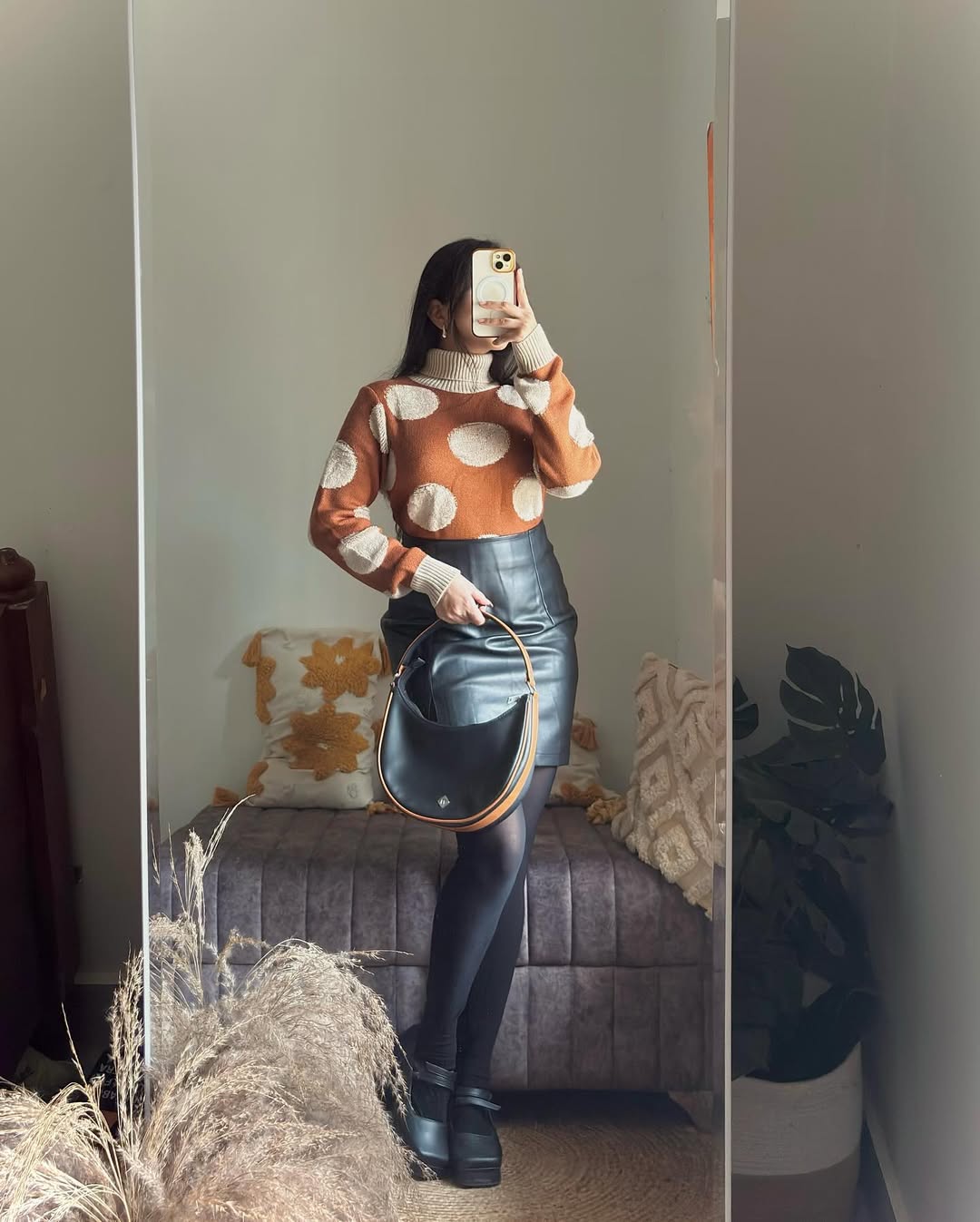 Stylish Polka Dot Sweater with Leather Skirt