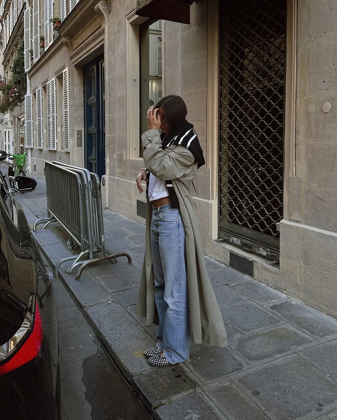 Chic trench coat paired with relaxed jeans