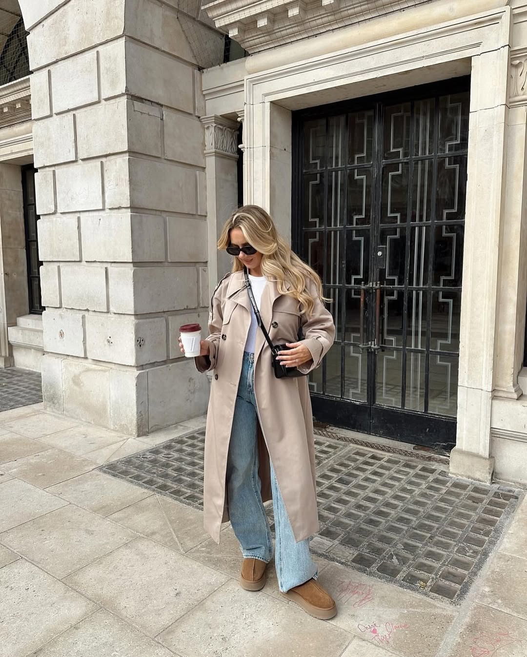 Chic trench coat paired with relaxed jeans