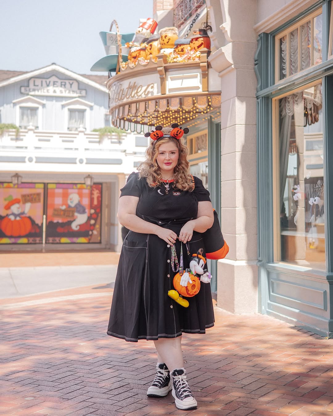 Chic black Disney outfit for fall vibes