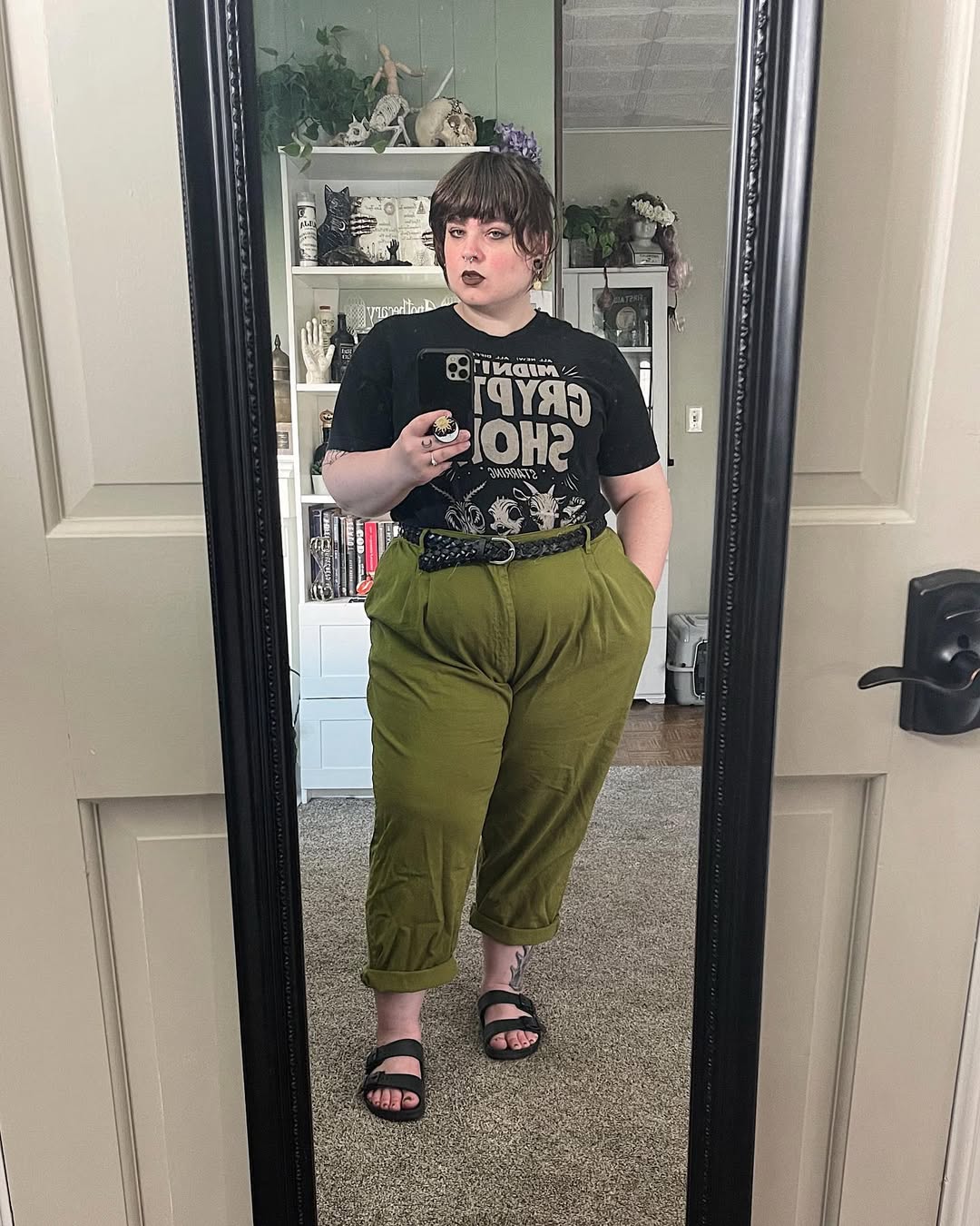 Chic green pants paired with graphic tee