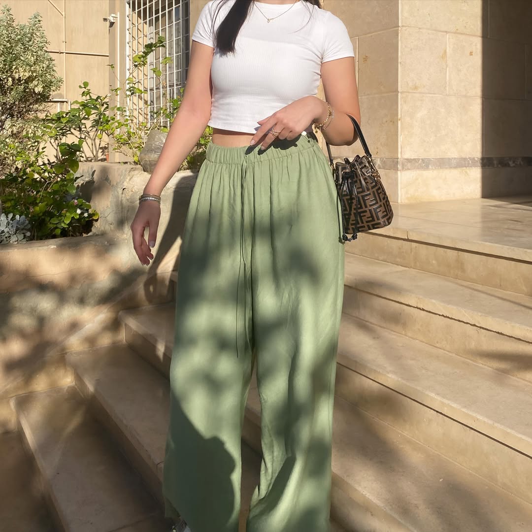 Chic summer look with green palazzo pants