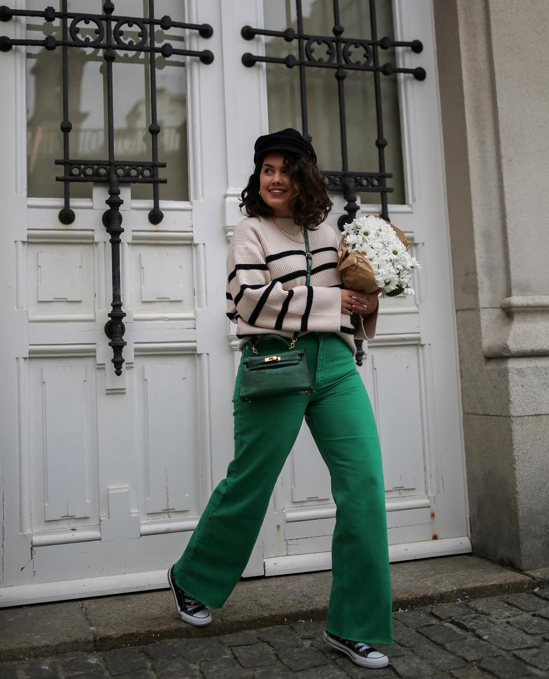 Chic green wide-leg pants with striped sweater