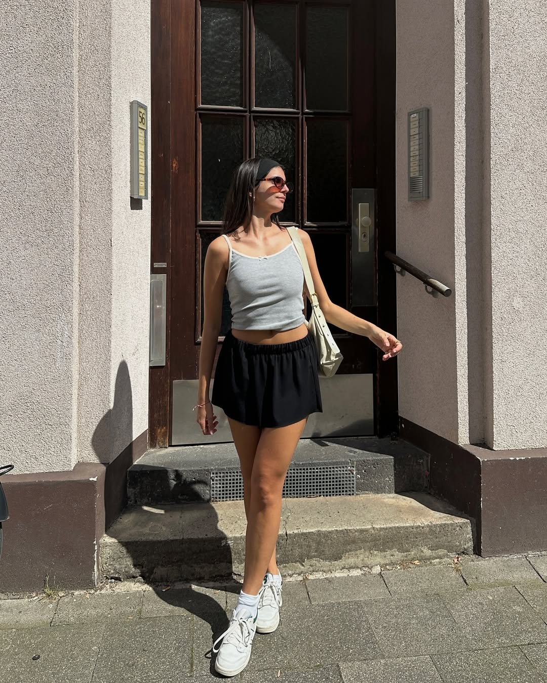 Chic black skirt paired with a gray crop top