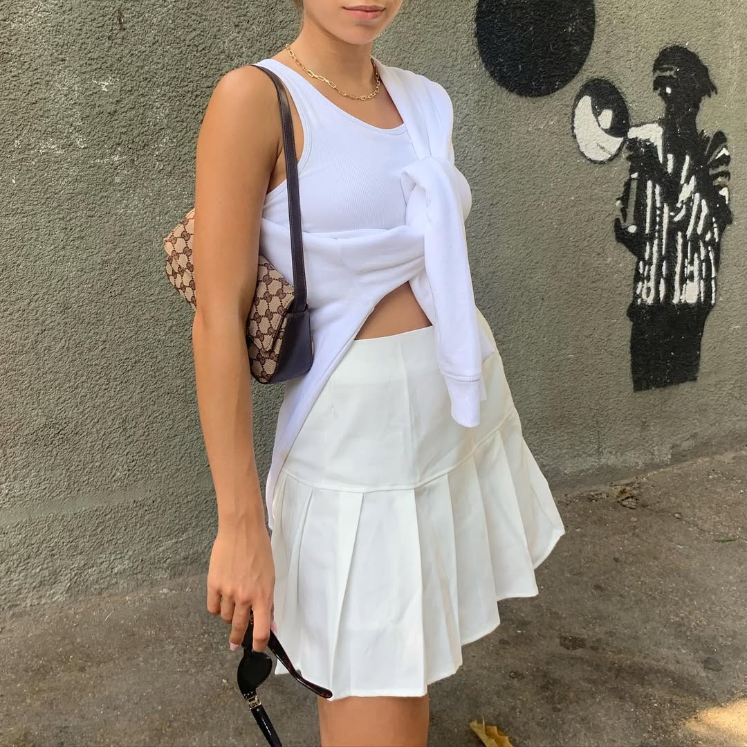 Chic urban look with tennis skirt ensemble