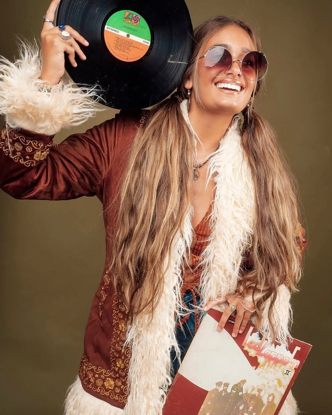 Chic 70s bohemian look with vinyl and flair