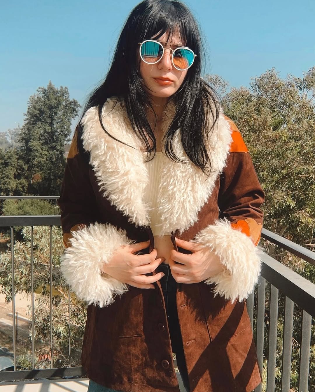 Chic retro fur-lined jacket with bold colors.
