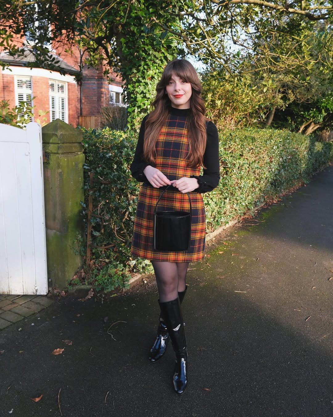 Chic 70s Plaid Dress with Black Accessories